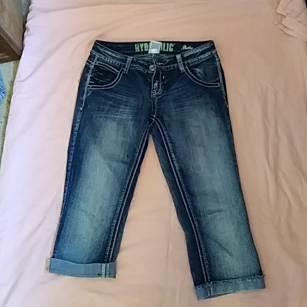 I'm selling a pair of long shorts or short jeans